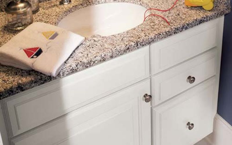 Bathroom sink with a granite countertop