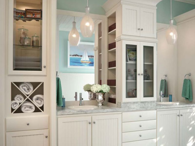 Bathroom remodeling project featuring a new marble countertop and cabinets.