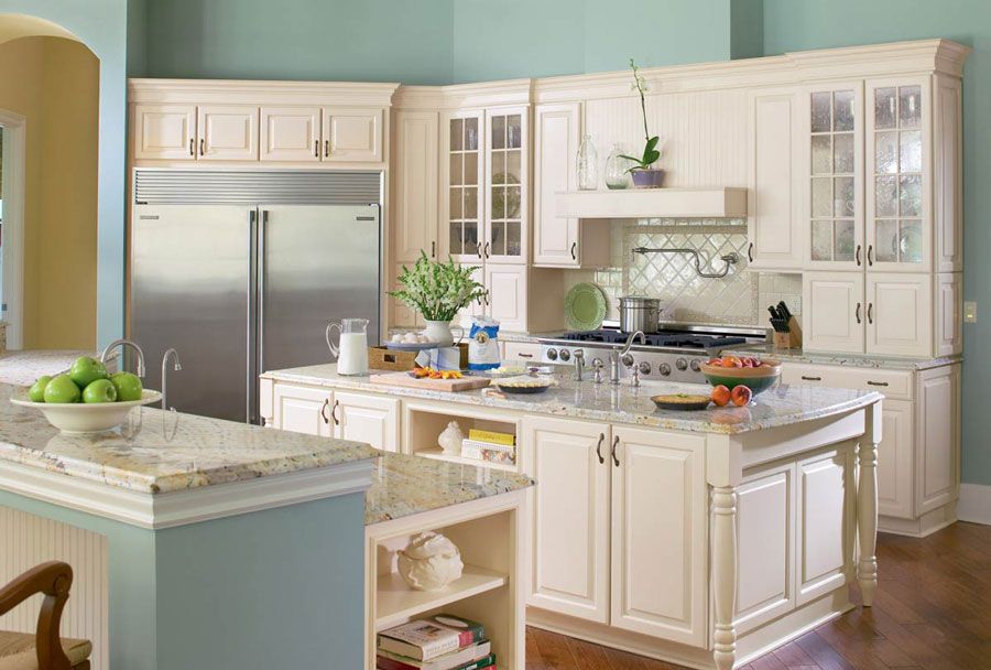 Kitchen renovation with new granite installation and cabinets.