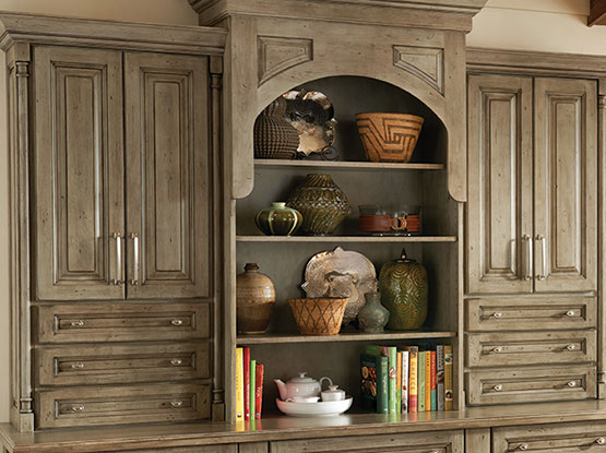 a scene with custom cabinets with vintage finish